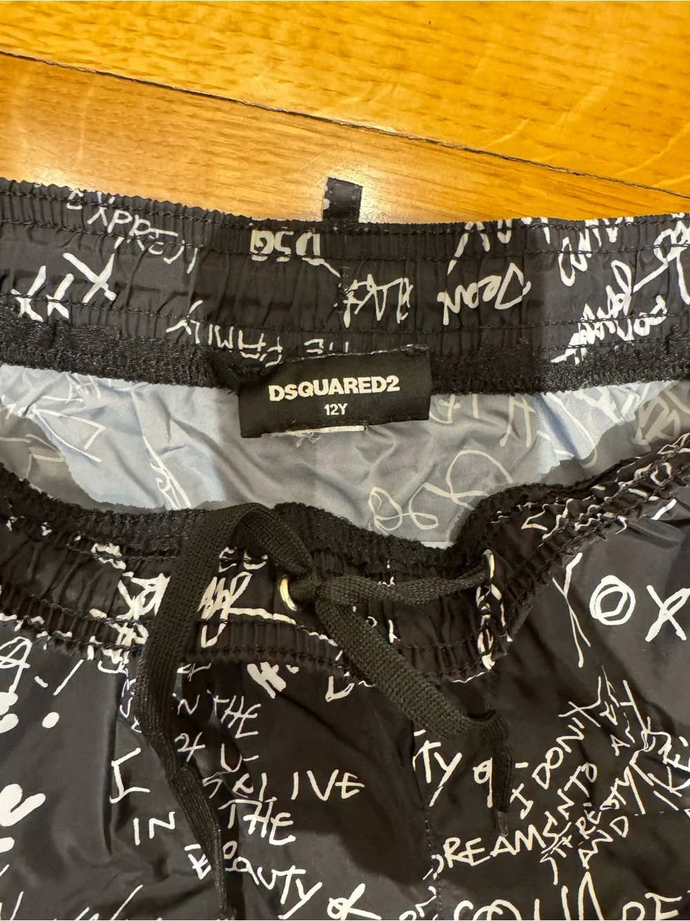 4 pairs of swim shorts Kids Graphic and Solid swim Shorts Pack - size 12